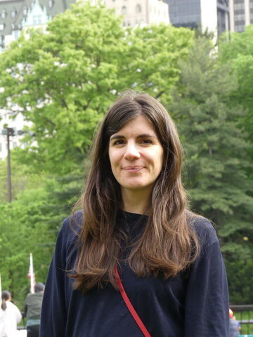 A smiling brunette woman